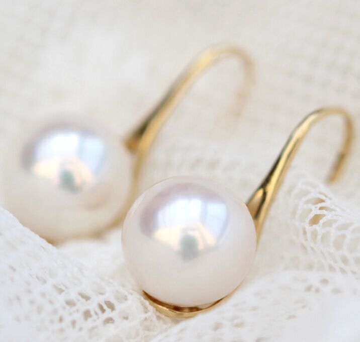 Natural south sea white pearl earrings yellow gold